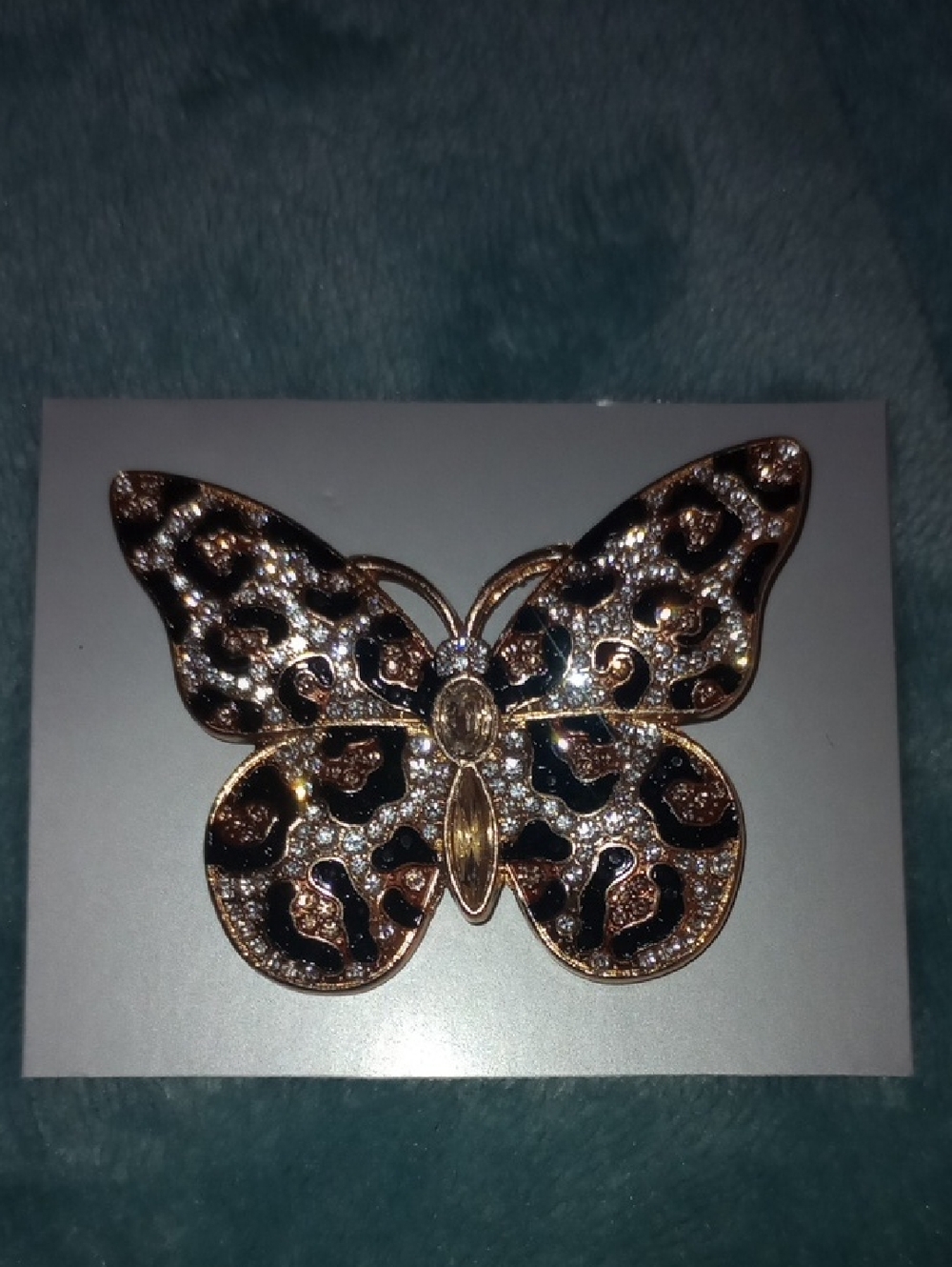 Elegant Butterfly Brooch in Black and Gold Leopard Pattern
